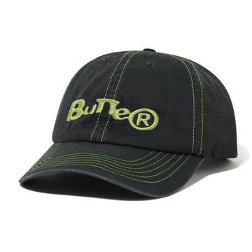 Butter Goods Registered 6 Panel Cap Washed Black Front.